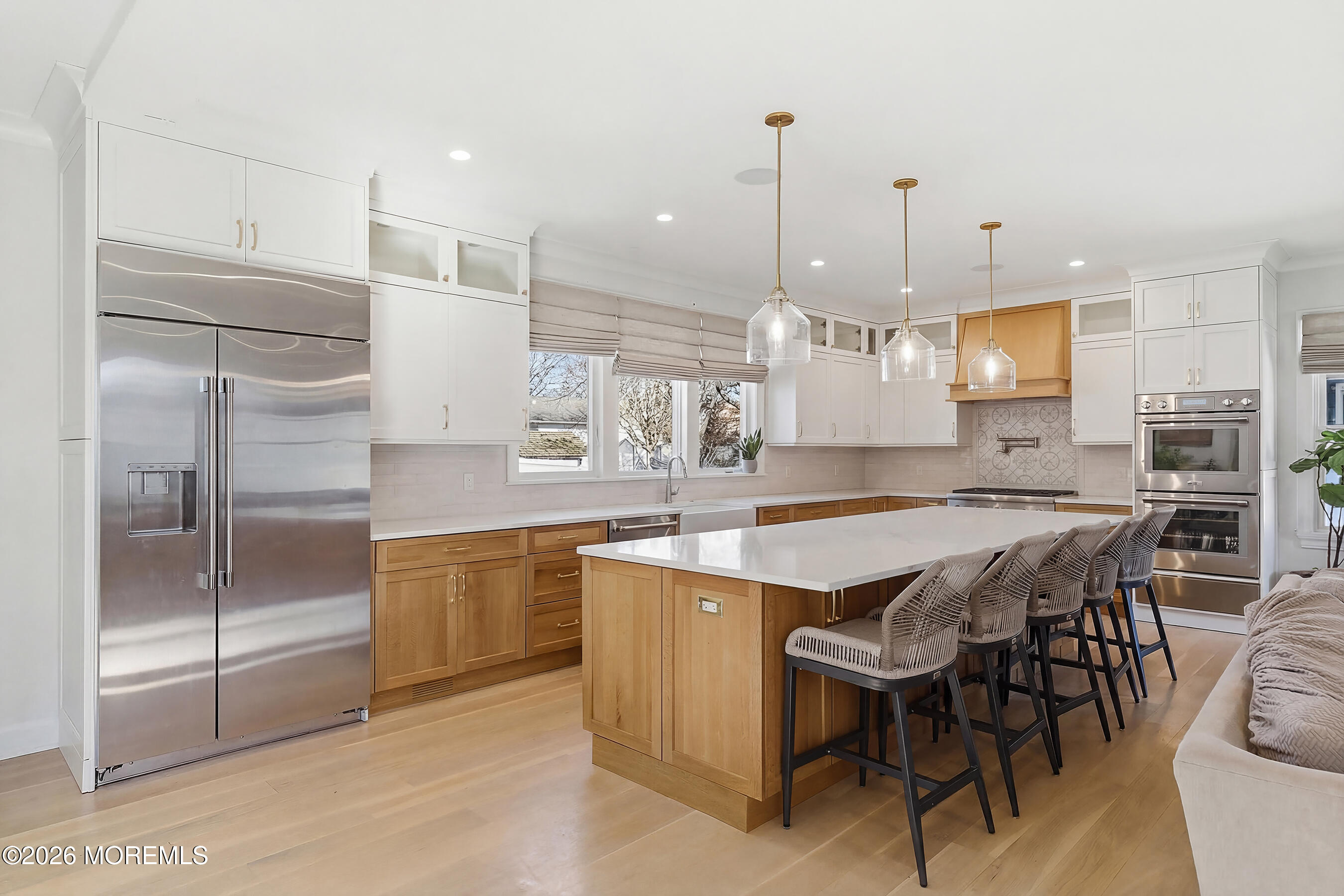 1603 Jackson Street Point Pleasant, NJ 08742 - Photo 6 of 45 a kitchen with stainless steel appliances granite countertop a kitchen island a stove and a refrigerator
