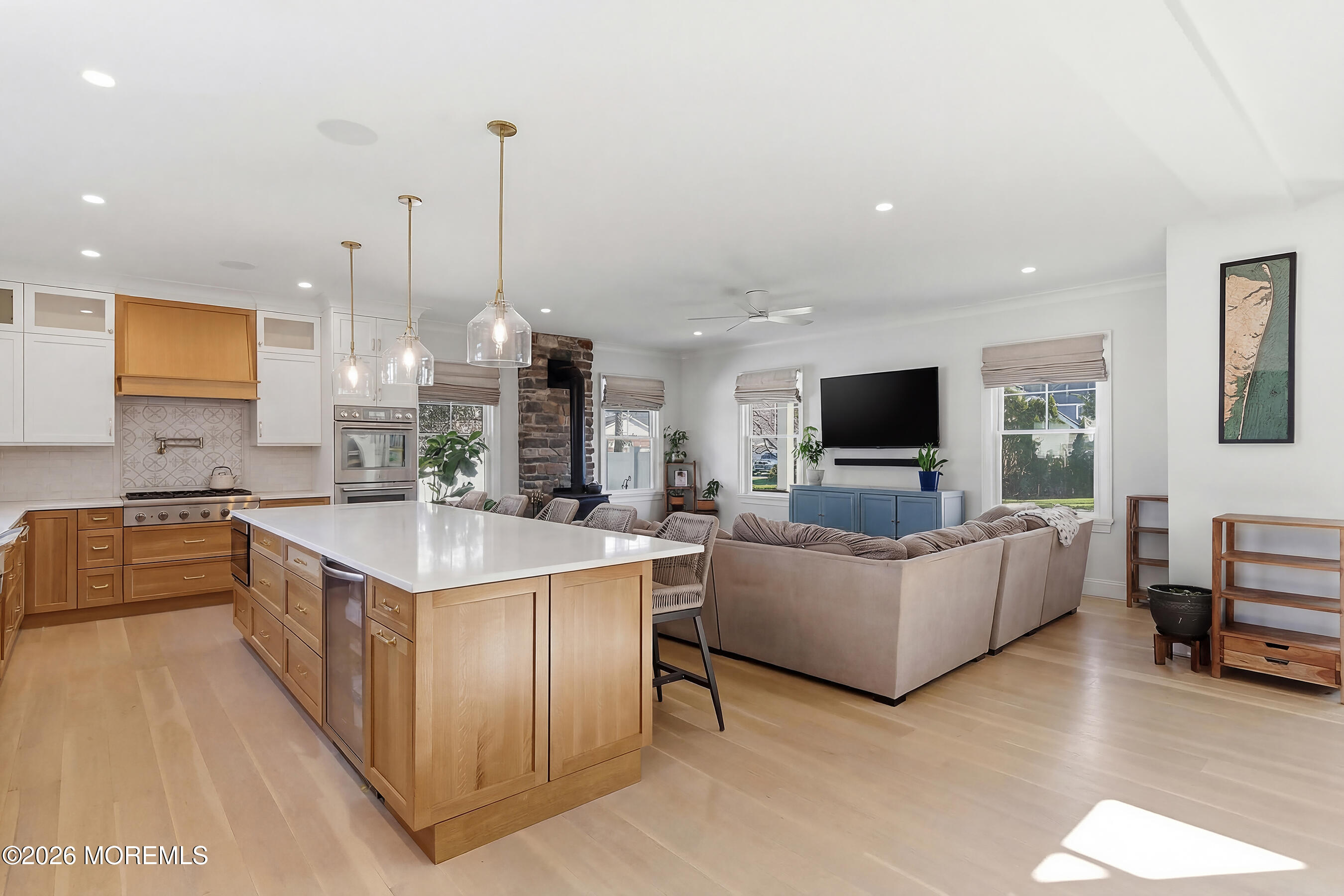 1603 Jackson Street Point Pleasant, NJ 08742 - Photo 8 of 45 a large kitchen with kitchen island a sink a counter top space and stainless steel appliances