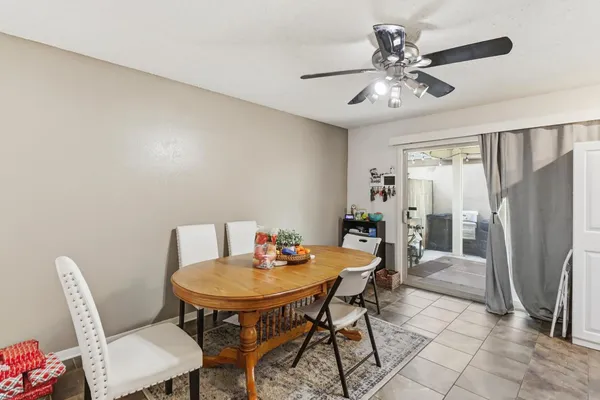 a kitchen with a sink a stove and cabinets