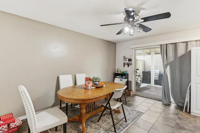 a kitchen with a sink a stove and cabinets