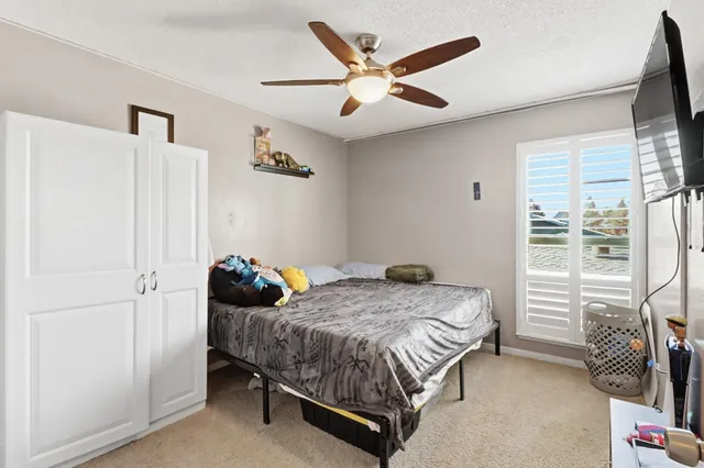 a bathroom with a sink vanity and a mirror