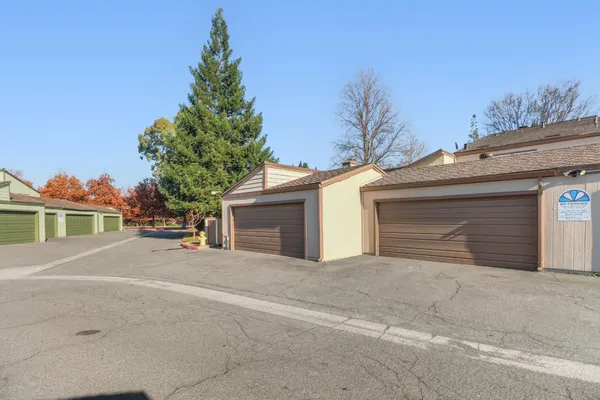 a view of backyard with green space