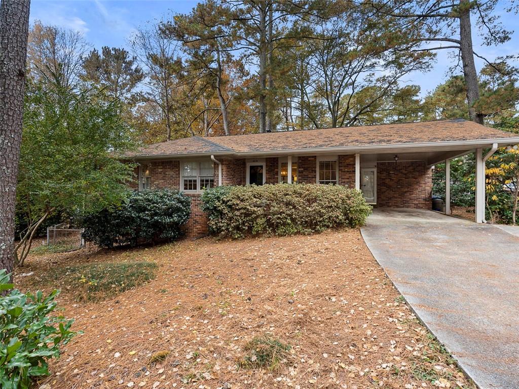 4074 North Shallowford Road Chamblee, GA 30341 - Photo 1 of 1 front view of a house with a yard