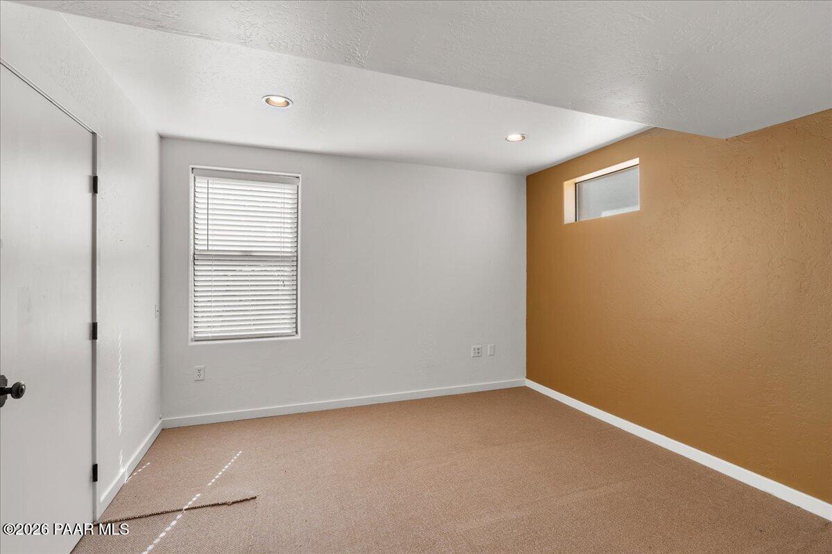 646 South Rancho Vista Drive Prescott, AZ 86303 - Photo 30 of 50 an empty room with a empty space and a window