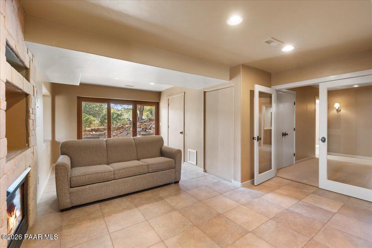 646 South Rancho Vista Drive Prescott, AZ 86303 - Photo 32 of 50 a living room with furniture and a open kitchen view