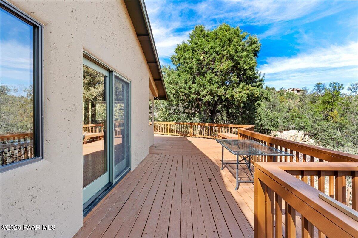 646 South Rancho Vista Drive Prescott, AZ 86303 - Photo 36 of 50 a view of balcony with wooden floor and fence