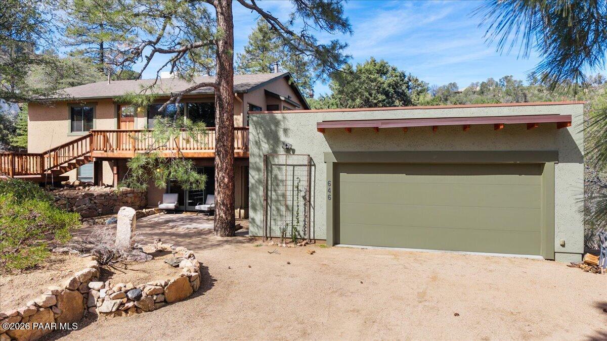 646 South Rancho Vista Drive Prescott, AZ 86303 - Photo 46 of 50 a view of a house with a yard and garage