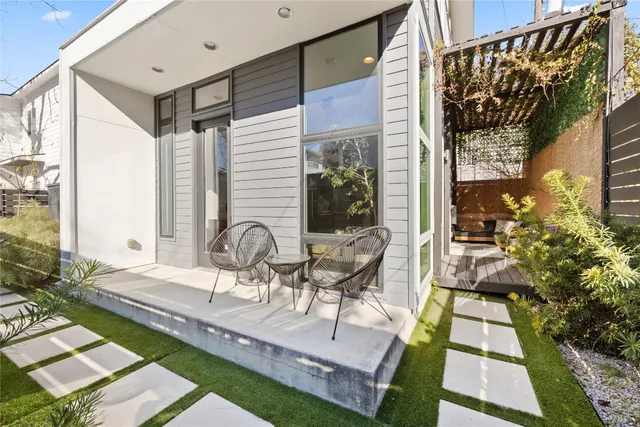 a house view with a outdoor seating space