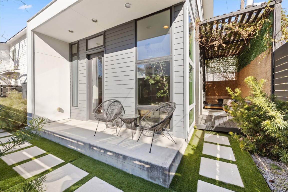a house view with a outdoor seating space