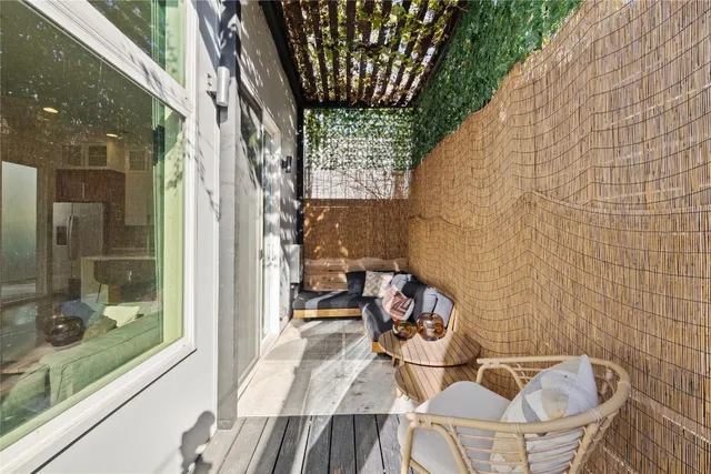 a view of balcony with a potted plant