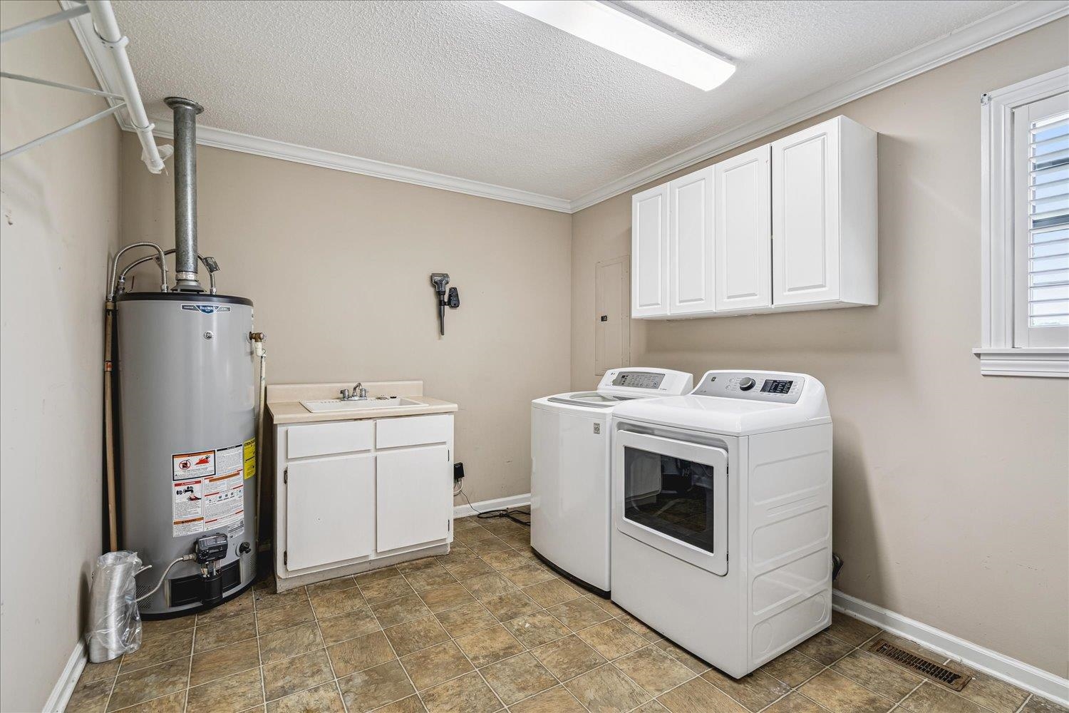 2132 Williams Switch Road Ripley, TN 38063 - Photo 15 of 33 New gas water heater.Sink