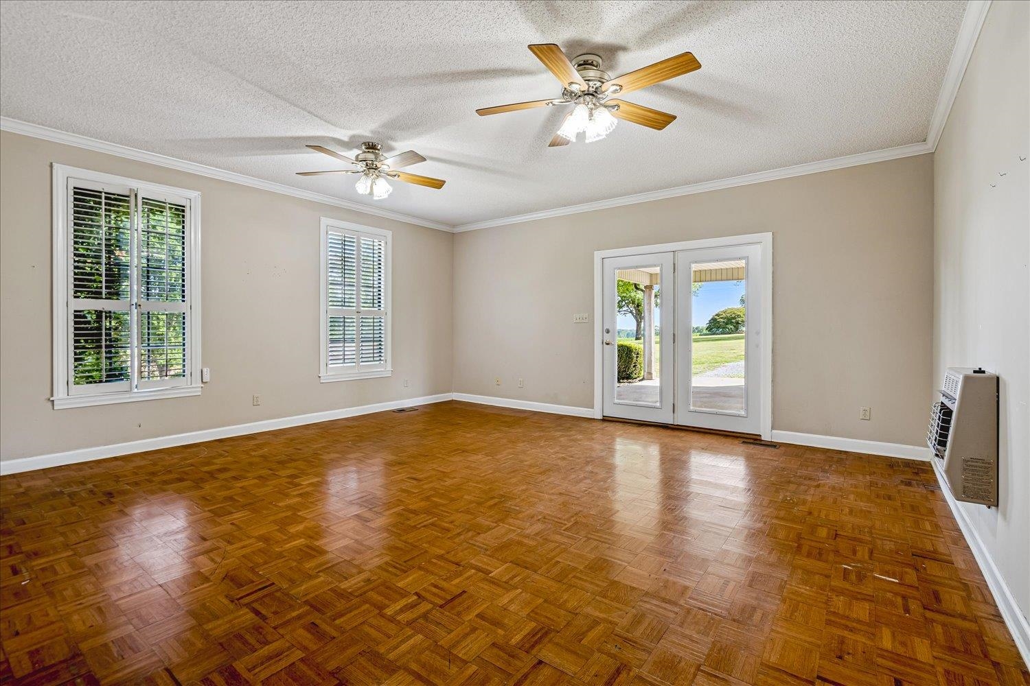 2132 Williams Switch Road Ripley, TN 38063 - Photo 16 of 33 located on first floor. Hardwood floors,back up heat on wall in case of power outage.