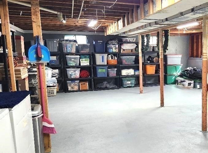 229 Washington Terrace Whitman, MA 02382 - Photo 25 of 30 a view of store room with racks