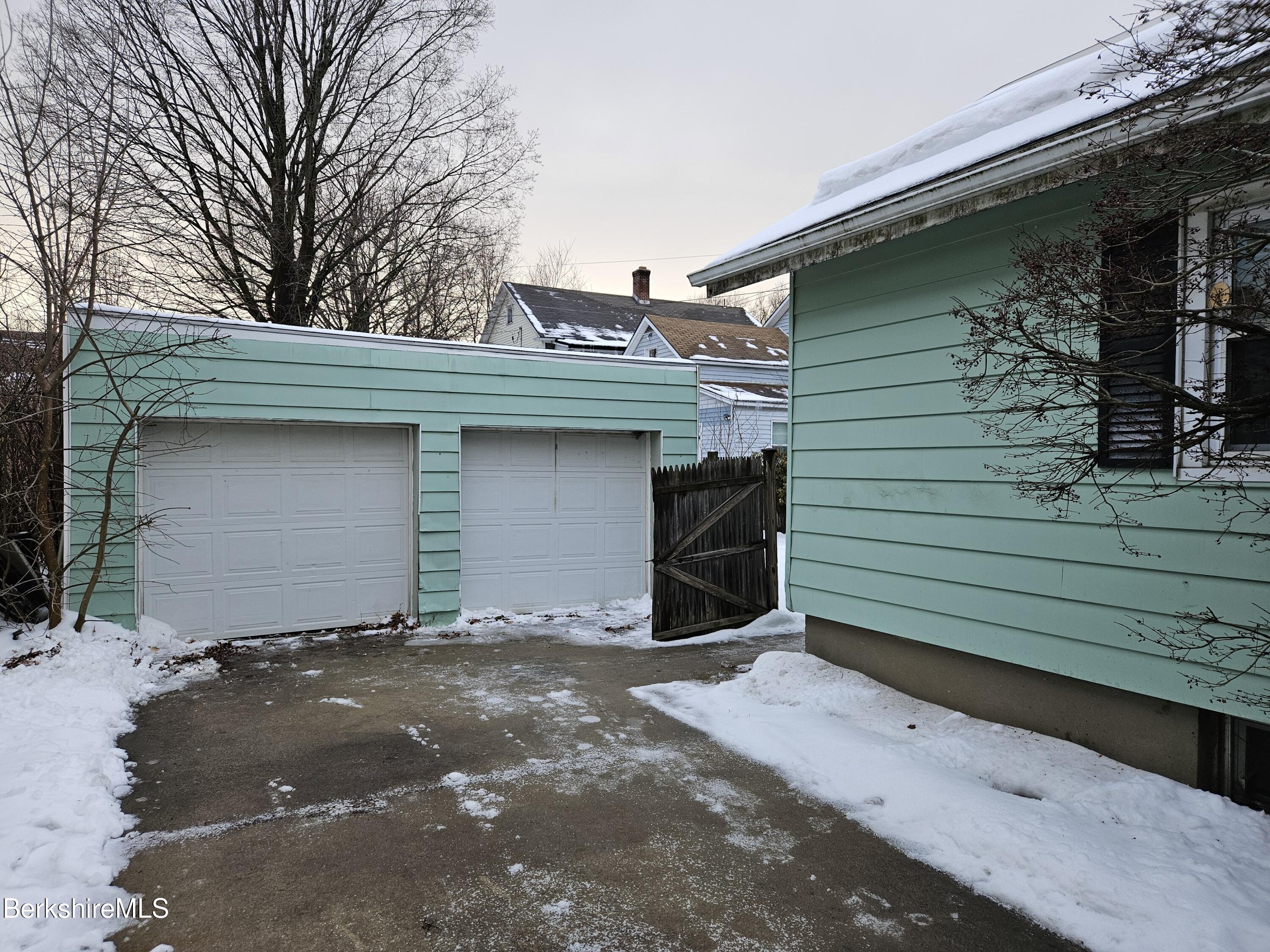 269 2nd Street Pittsfield, MA 01201 - Photo 3 of 39 a view of a house with a garage