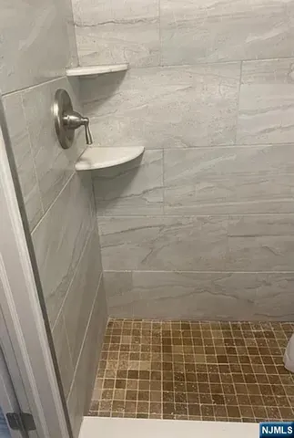 a bathroom with a toilet and a sink