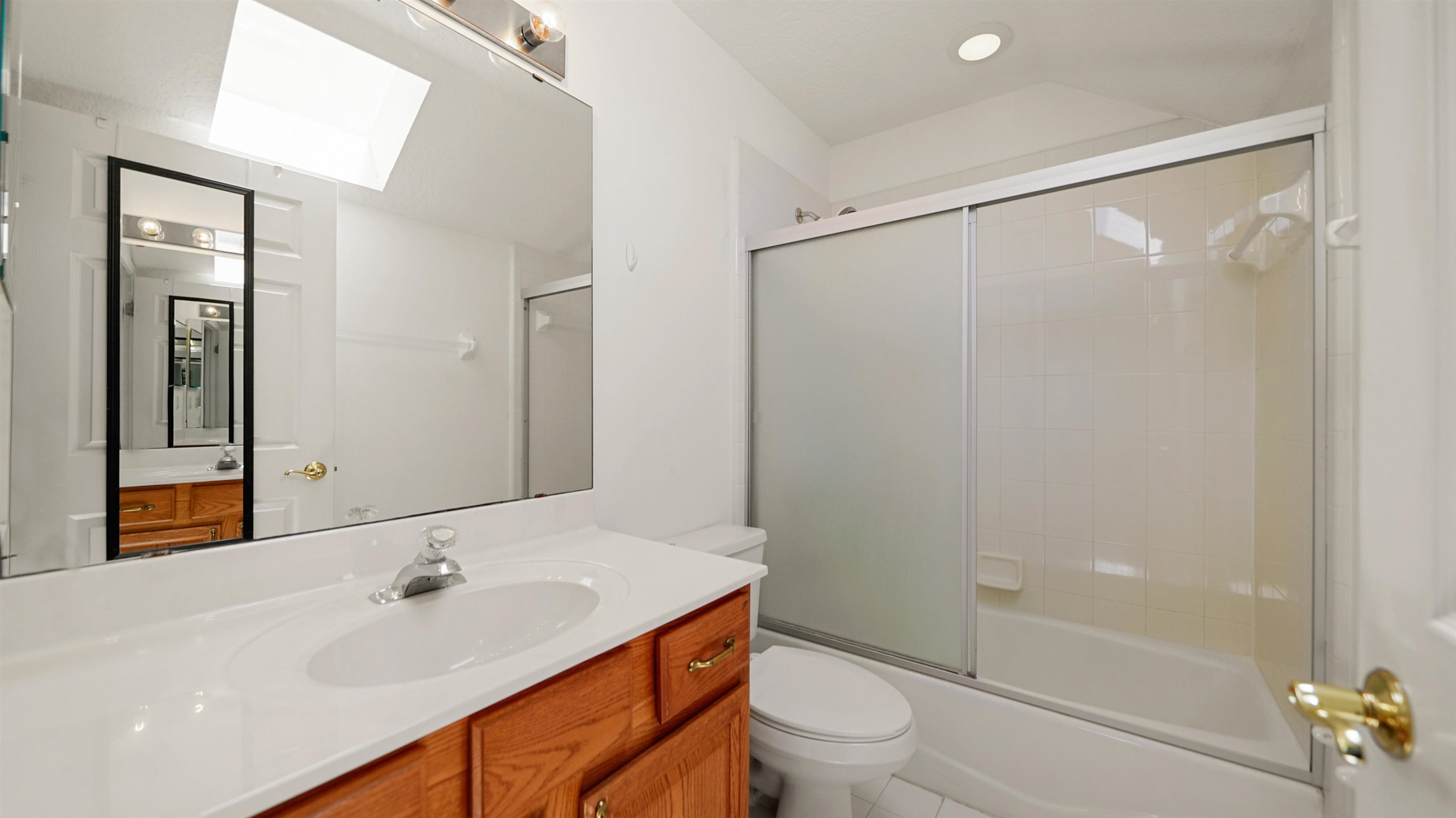 7849 Rittenhouse Lane Jacksonville, FL 32256 - Photo 30 of 50 a bathroom with a sink toilet and shower
