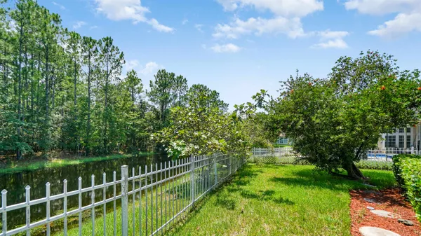 a balcony with trees in the background