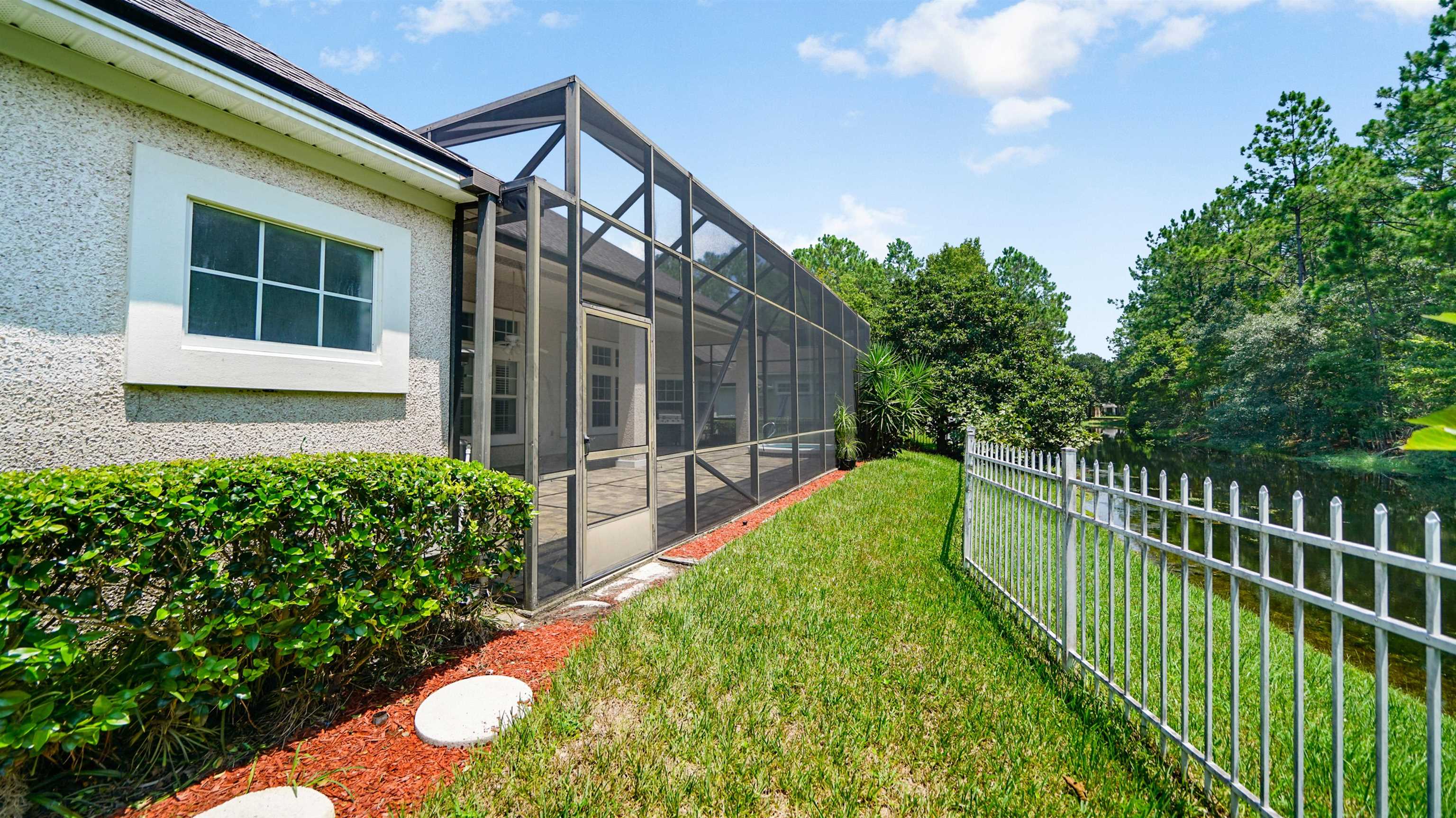 7849 Rittenhouse Lane Jacksonville, FL 32256 - Photo 36 of 50 a view of a house with backyard and garden