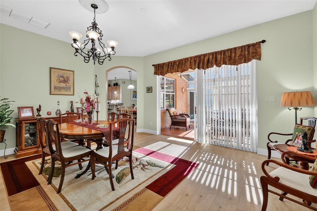 25517 Laurel Valley Road Leesburg, FL 34748 - Photo 12 of 56 a view of a livingroom and dining room