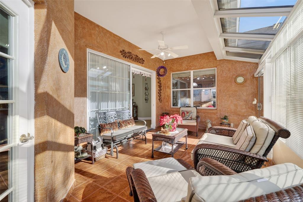 25517 Laurel Valley Road Leesburg, FL 34748 - Photo 14 of 56 a living room with furniture and a large window