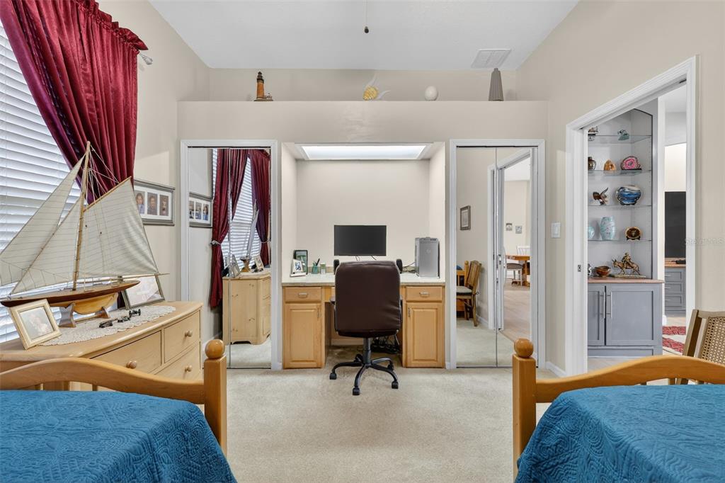 25517 Laurel Valley Road Leesburg, FL 34748 - Photo 34 of 56 a view of a livingroom with workspace and a window