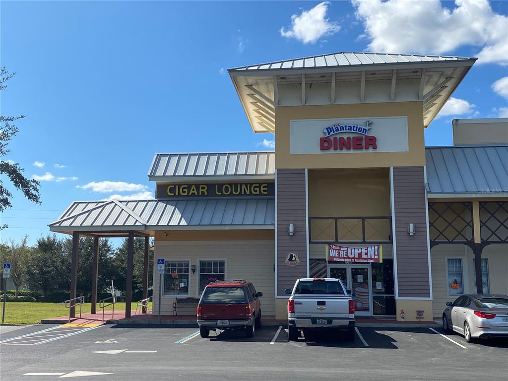 25517 Laurel Valley Road Leesburg, FL 34748 - Photo 56 of 56 a car parked in front of a building