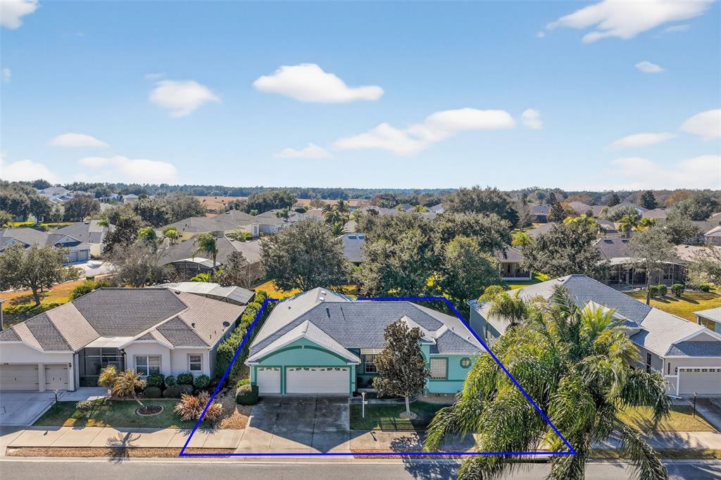 25517 Laurel Valley Road Leesburg, FL 34748 - Photo 7 of 56 a view of multiple houses with a city street