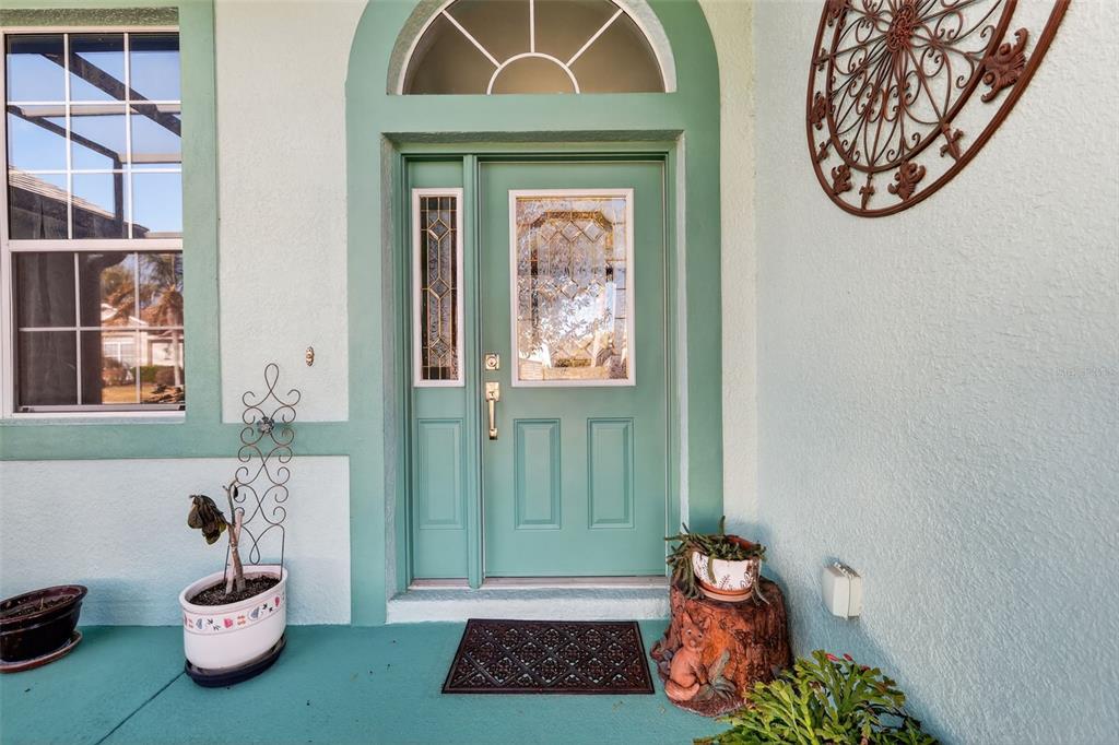 25517 Laurel Valley Road Leesburg, FL 34748 - Photo 10 of 56 a front view of a house with garden