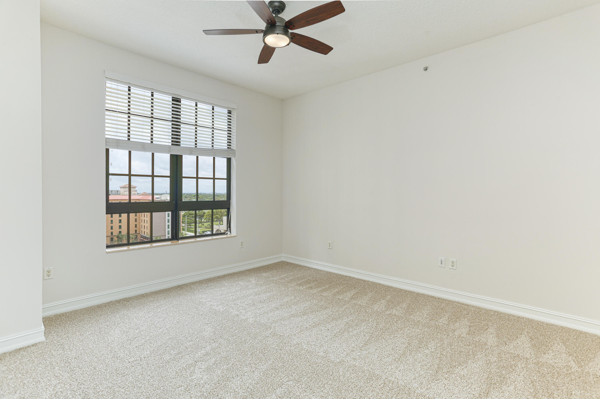 701 South Olive Avenue, Unit 603 West Palm Beach, FL 33401 - Photo 10 of 23 an empty room with a window