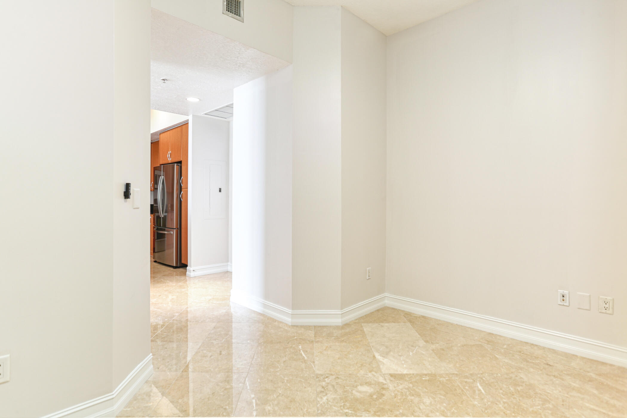 701 South Olive Avenue, Unit 603 West Palm Beach, FL 33401 - Photo 4 of 23 a view of a room with a hallway