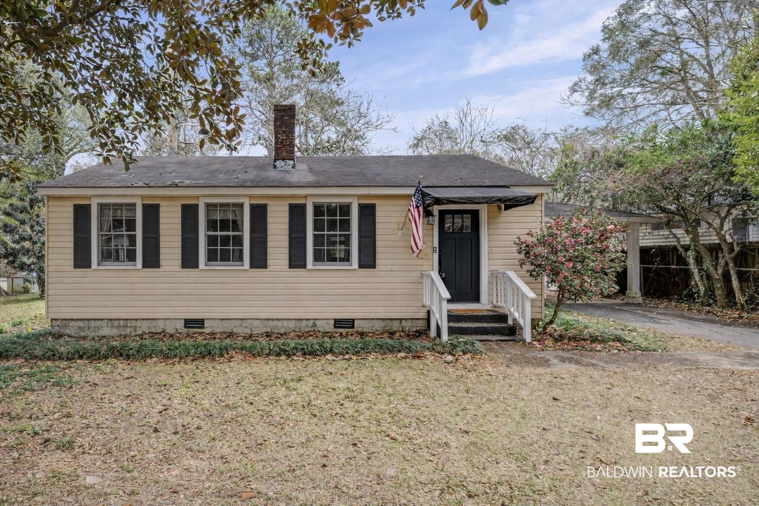 5117 Norton Lane Mobile, AL 36608 - Photo 1 of 35 View of front of home with crawl space, a chimney, entry steps, and a shingled roof