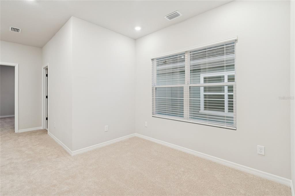 4317 Roush Avenue Orlando, FL 32803 - Photo 16 of 39 a view of an empty room with a window