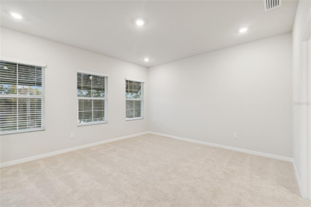 4317 Roush Avenue Orlando, FL 32803 - Photo 18 of 39 an empty room with windows
