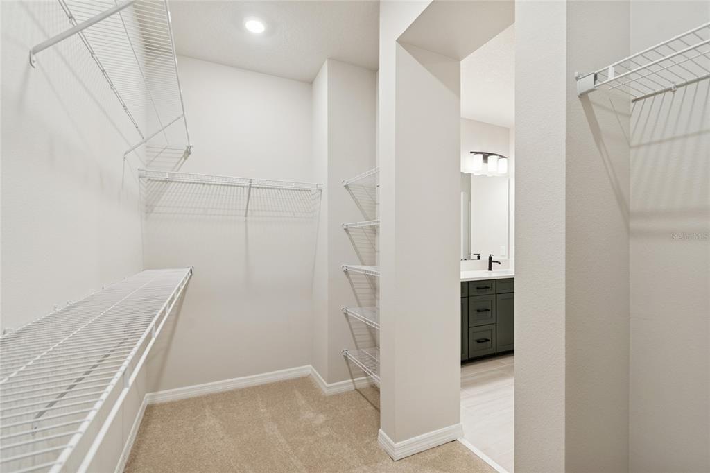 4317 Roush Avenue Orlando, FL 32803 - Photo 24 of 39 a view of walk in closet with cabinet