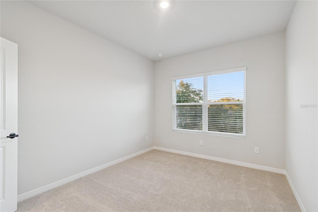 4317 Roush Avenue Orlando, FL 32803 - Photo 25 of 39 a view of an empty room with a window