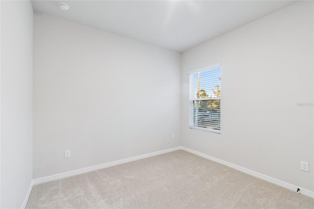 4317 Roush Avenue Orlando, FL 32803 - Photo 28 of 39 a room that has a window in it