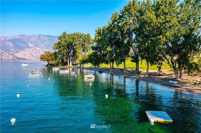 a view of a swimming pool with an outdoor space and seating area