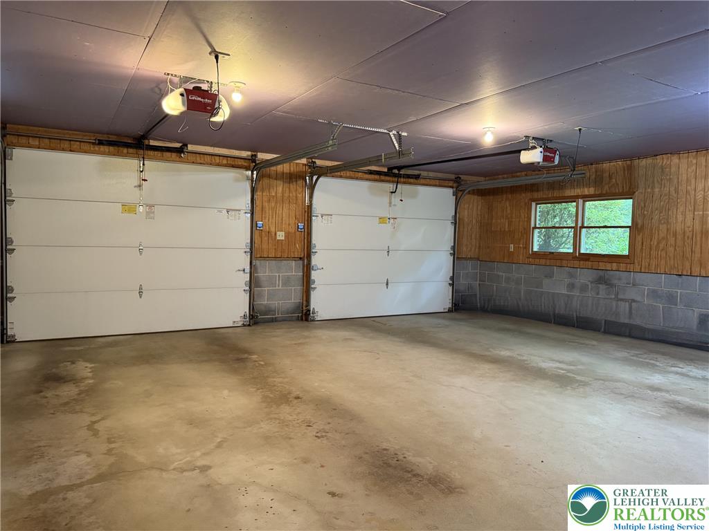 525 Pinewood Road Lehighton, PA 18235 - Photo 33 of 51 2 spacious garage bays with ample room for storage.