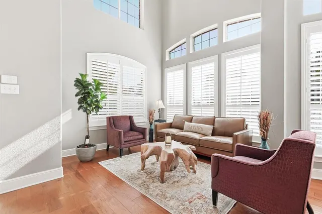 a kitchen with stainless steel appliances granite countertop a sink a stove and refrigerator