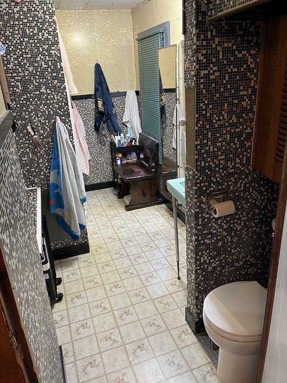 30 Manitou Road Canton, MA 02021 - Photo 19 of 25 a bathroom with a toilet and a shower