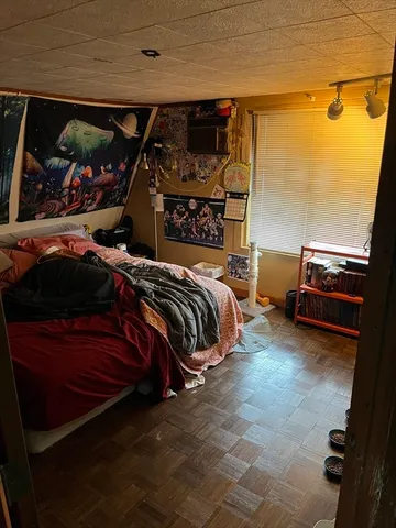 a front view of a building with retail shops