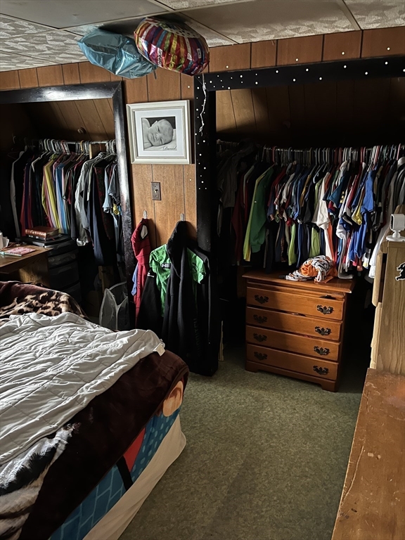30 Manitou Road Canton, MA 02021 - Photo 21 of 25 a view of walk in closet with clothes and shoes