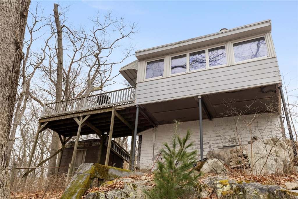 30 Manitou Road Canton, MA 02021 - Photo 4 of 25 a view of a house with a yard