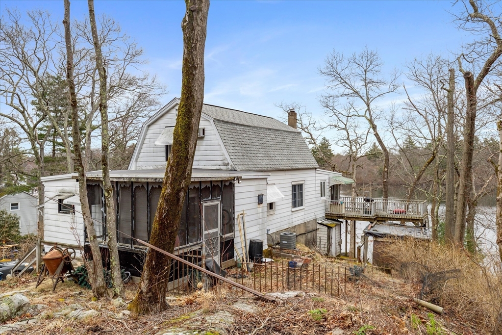 30 Manitou Road Canton, MA 02021 - Photo 7 of 25 a view of a house with wooden fence