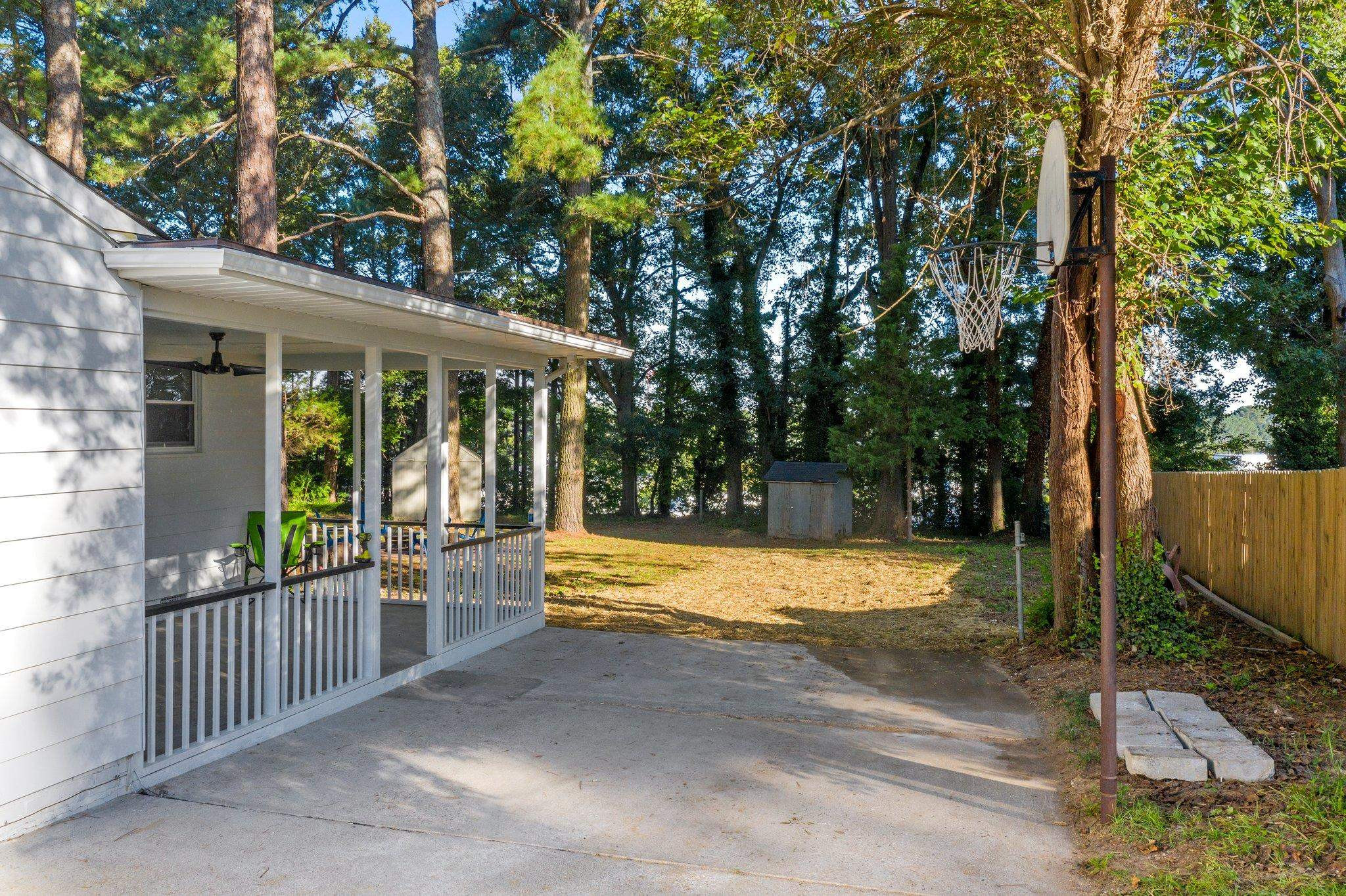 317 Quail Drive Raleigh, NC 27604 - Photo 22 of 29 Driveway with Basketball Goal