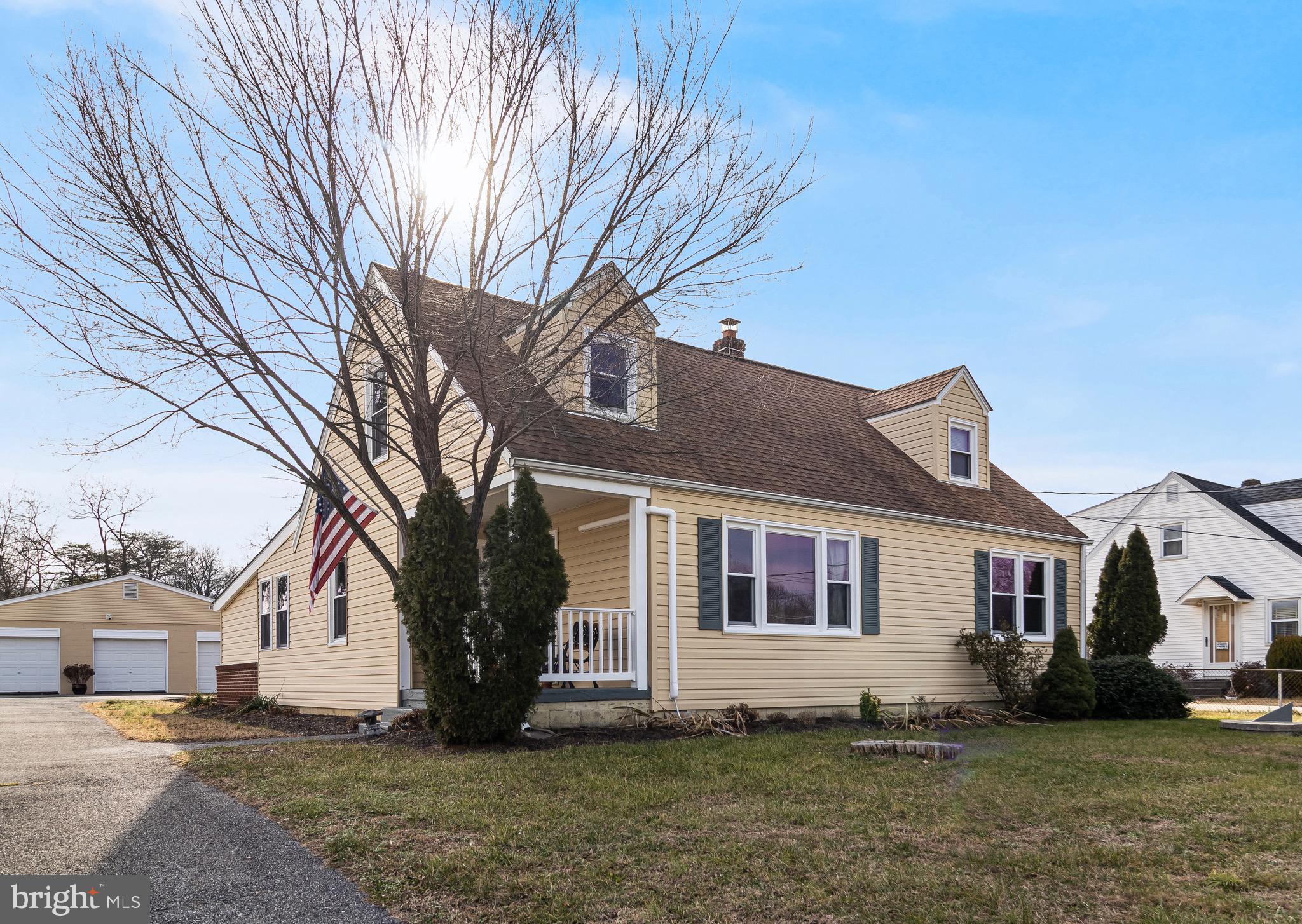 a view of a yard in front of a house