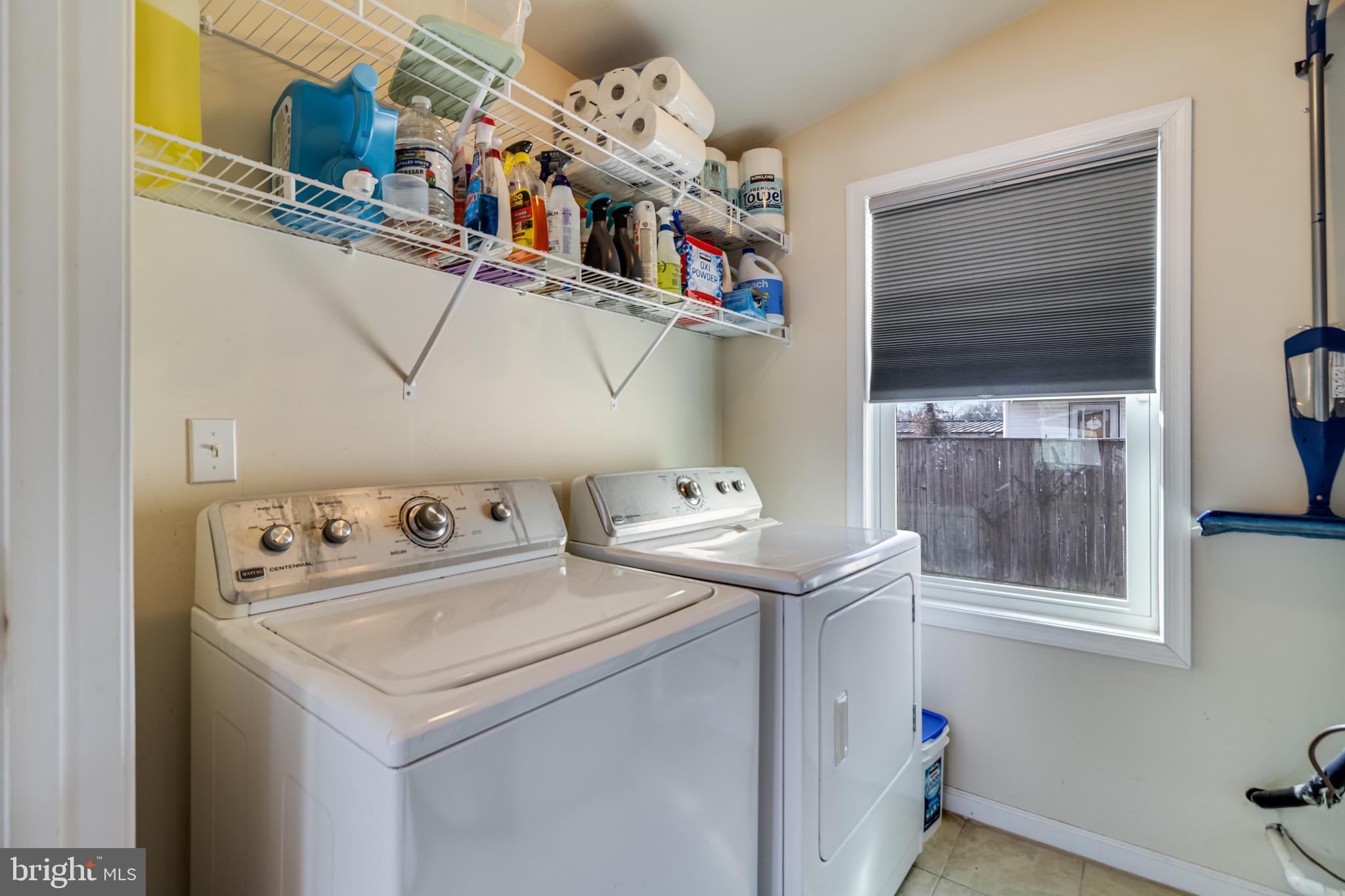 6905 East Clinton Street Clinton, MD 20735 - Photo 22 of 47 a utility room with dryer and washer