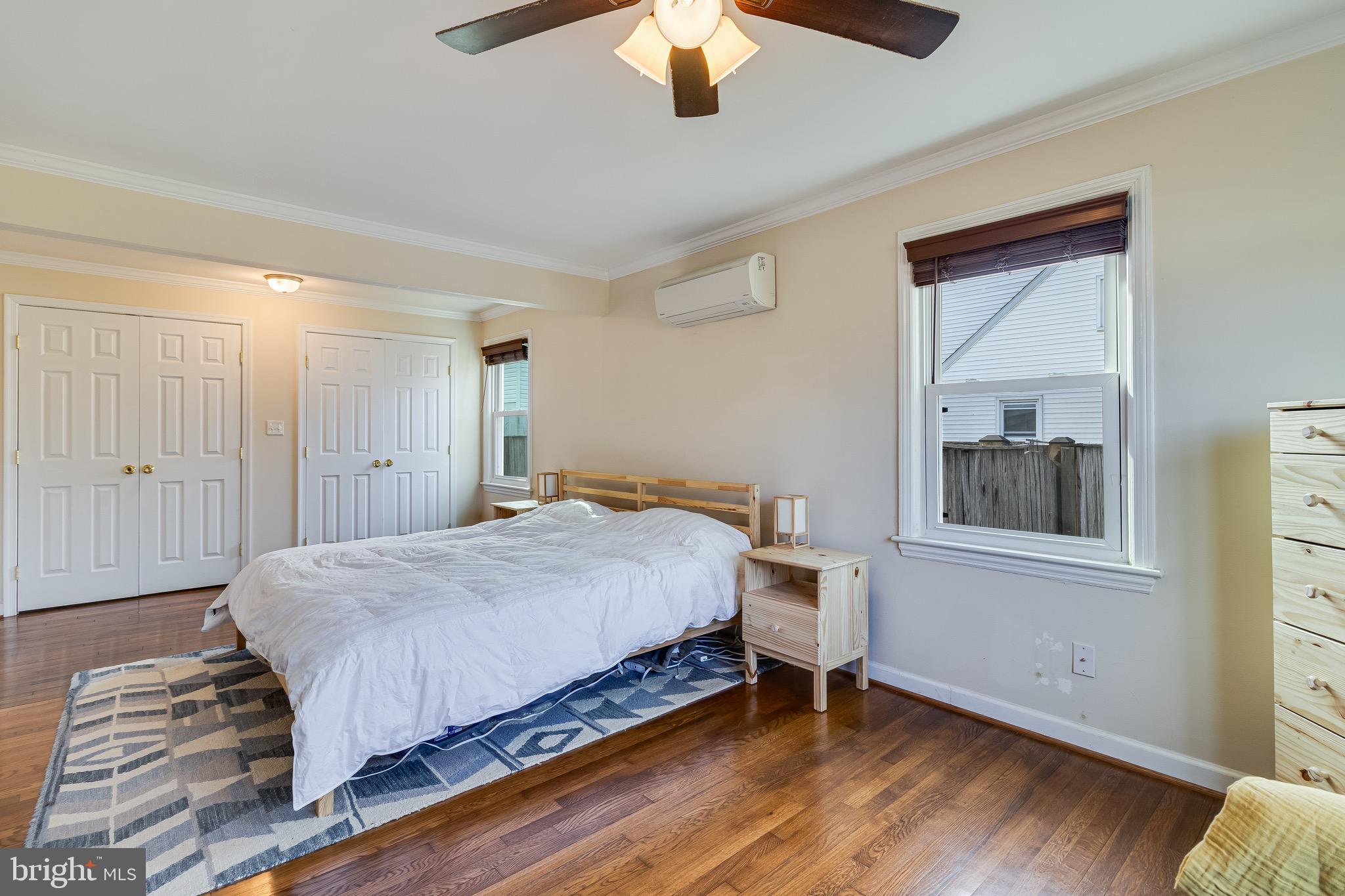 6905 East Clinton Street Clinton, MD 20735 - Photo 25 of 47 a bedroom with a bed and a window