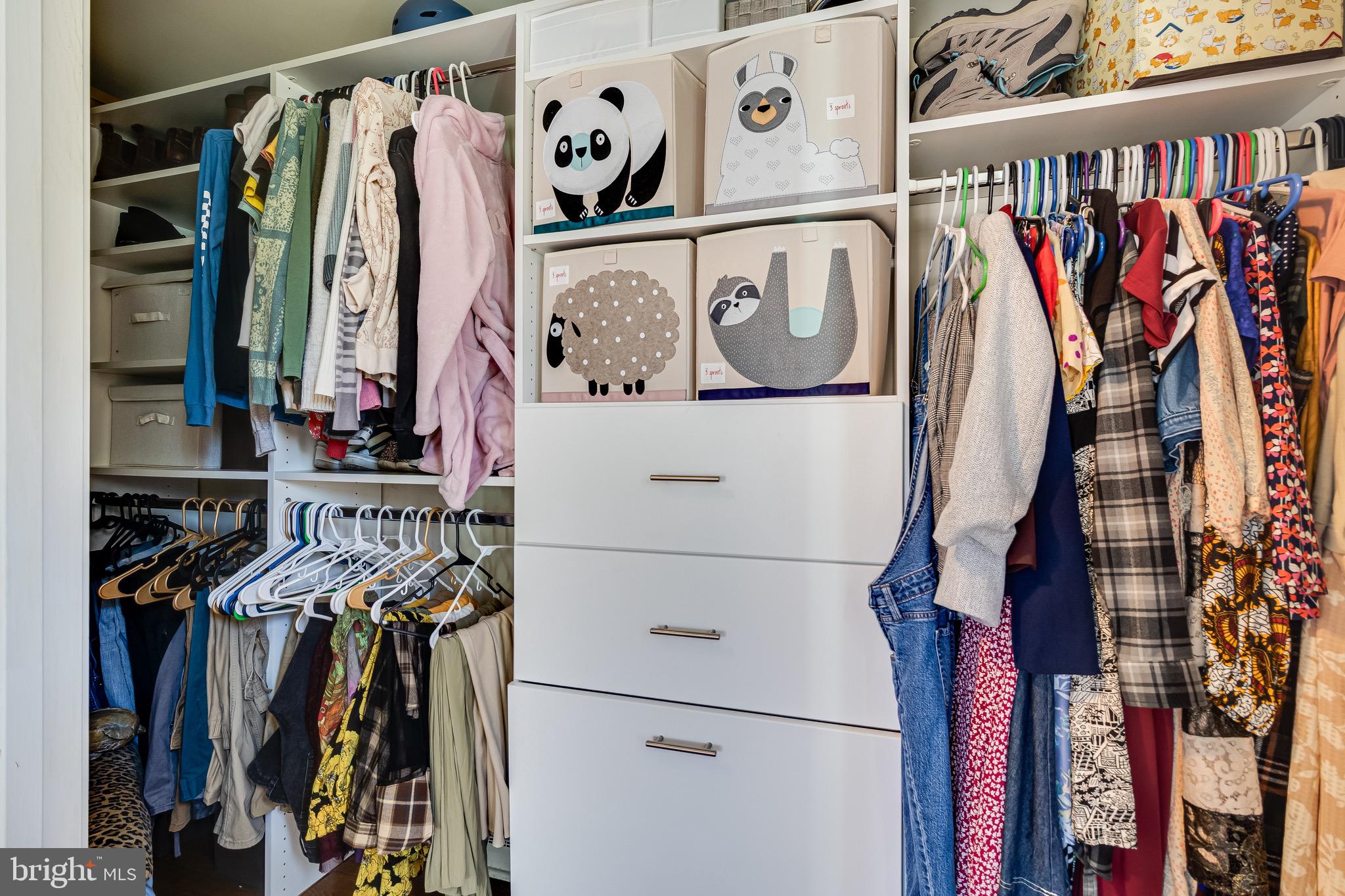 6905 East Clinton Street Clinton, MD 20735 - Photo 27 of 47 a view of walk in closet with clothes and shoes