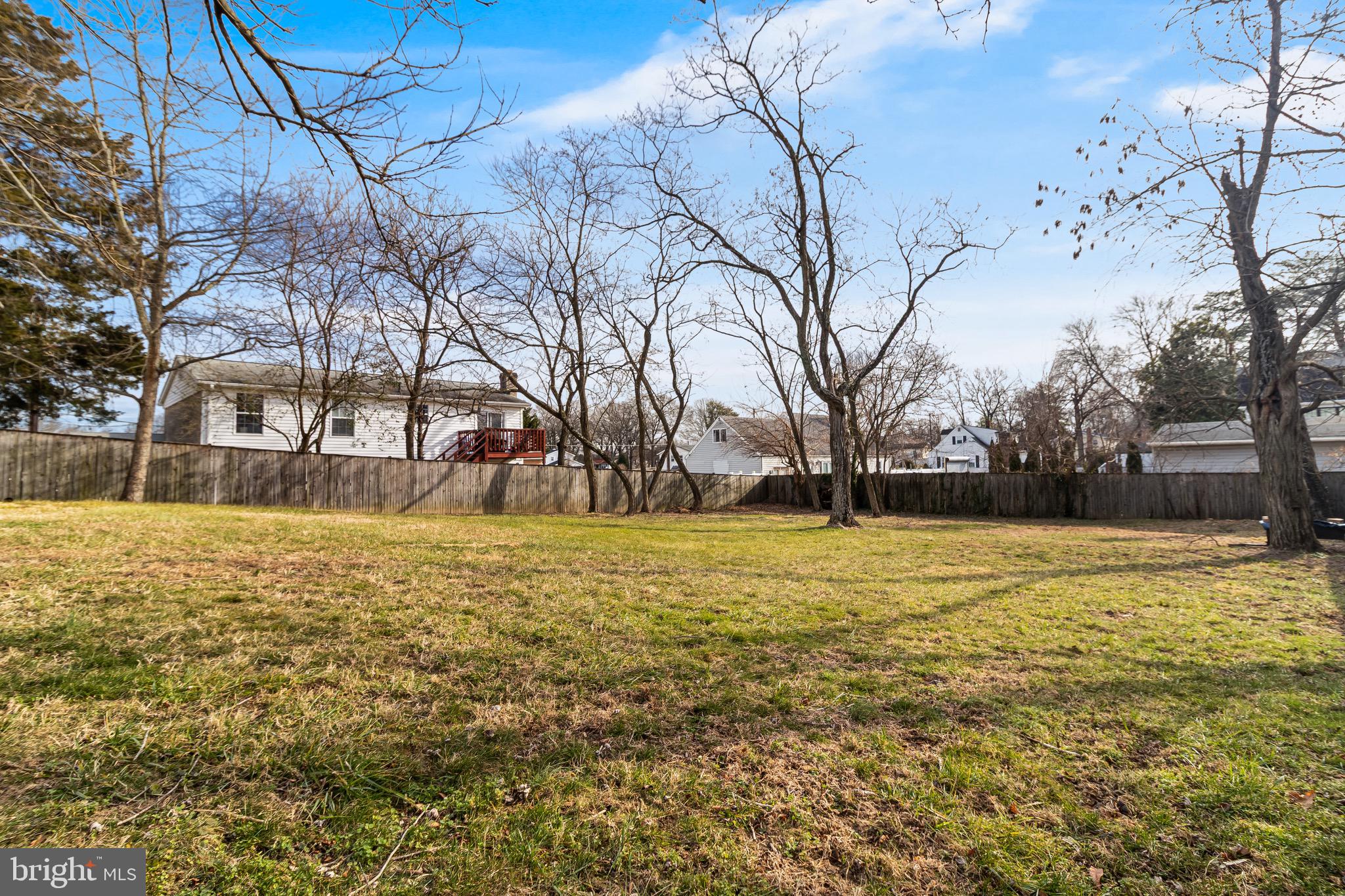 6905 East Clinton Street Clinton, MD 20735 - Photo 39 of 47 a yard with tall trees